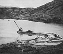 Members of the 86t Battalion at Adak -- Dredging surfacing material from Finger Bay for finish material on roads