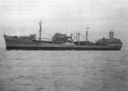 Kaskaskia (AO-27) leaves Mare Island Navy Yard 15 December 1941. Her arrangement is typical of the T3 tankers acquired after 1940, though the forward mounts appear to contain one 5-inch, 50-caliber and one 3-inch, 25-caliber gun--probably the only weapons then available in the rush to arm every ship during the first month of the war. (National Archives)