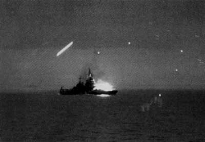 Maryland (BB 
46) is seen being hit by a kamikaze on the evening of 29 November 1944.